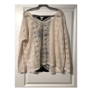 Cutout cream blouse with design on back